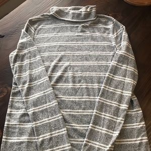 Caution to the wind turtleneck